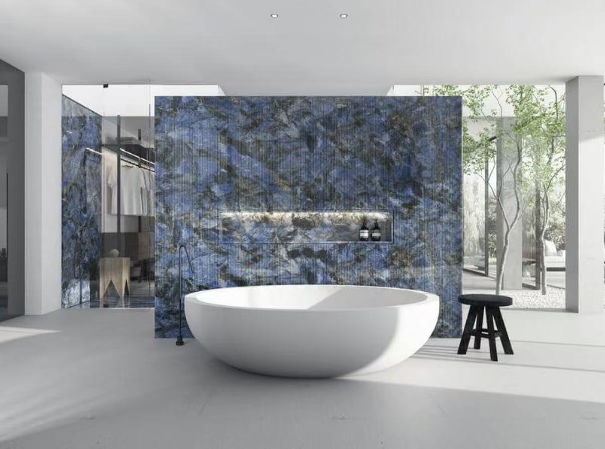 Contemporary South Australian bathroom with a natural stone feature wall and freestanding bath
